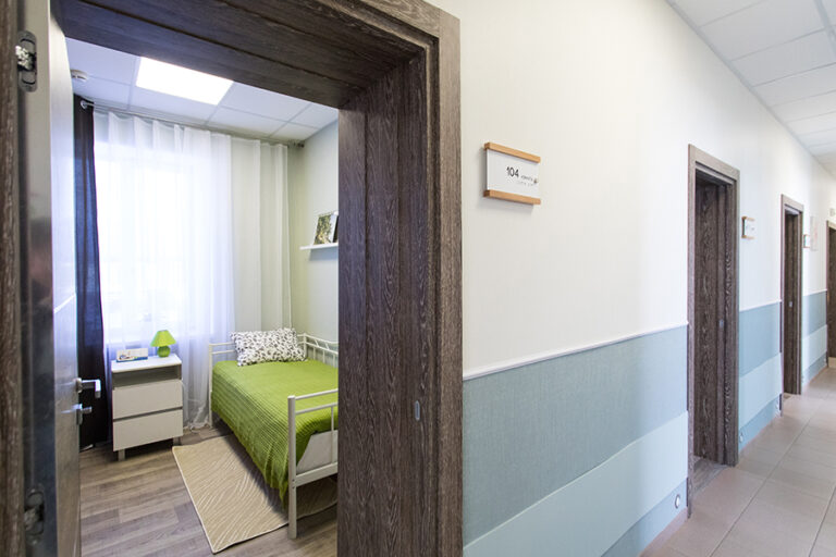 Freshly painted hallway inside a retirement community with durable low-VOC commercial wall coatings